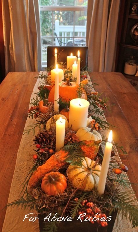 Build a long wood box, stain and add spanish moss, pumpkins, pinecones, candles, etc.. This is beautiful from Far Above Rubies: Thanksgiving preview...